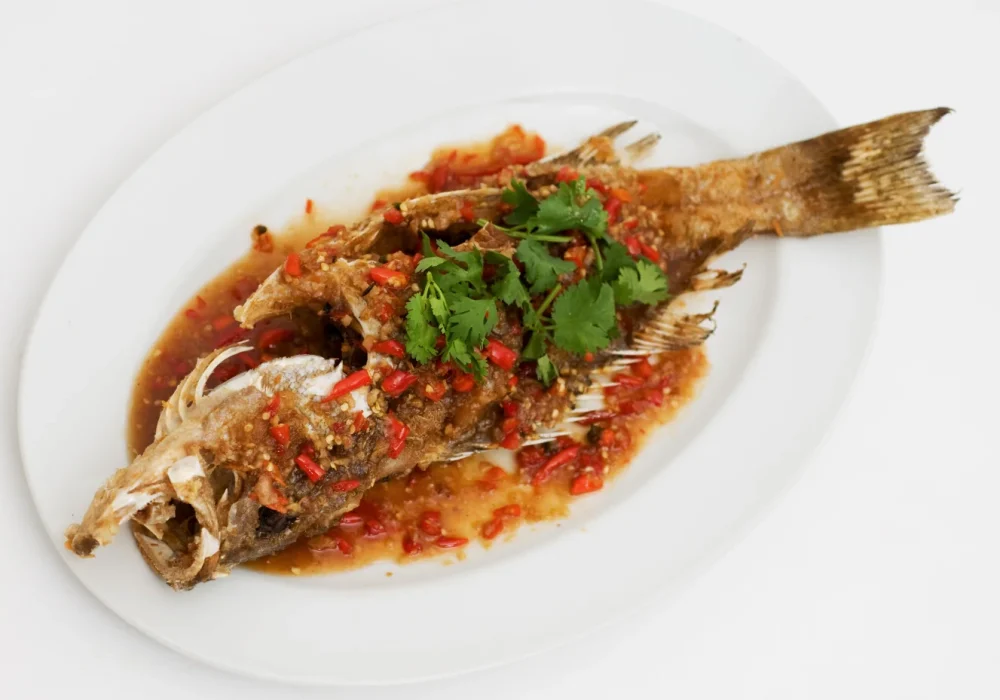 ปลากะพงราดพริก-SEA-BASS-TOPPED-WITH-CHILLI-SAUCE.webp