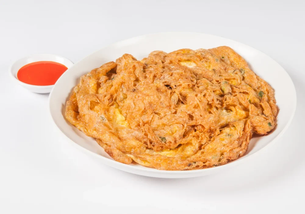ไข่เจียวหมูสับ-กุ้งสับ-เนื้อปู-หอยนางรม-THAI-STYLE-OMELETTE-WITH-PORK-SHRIMP-CRAB-OYSTER.webp